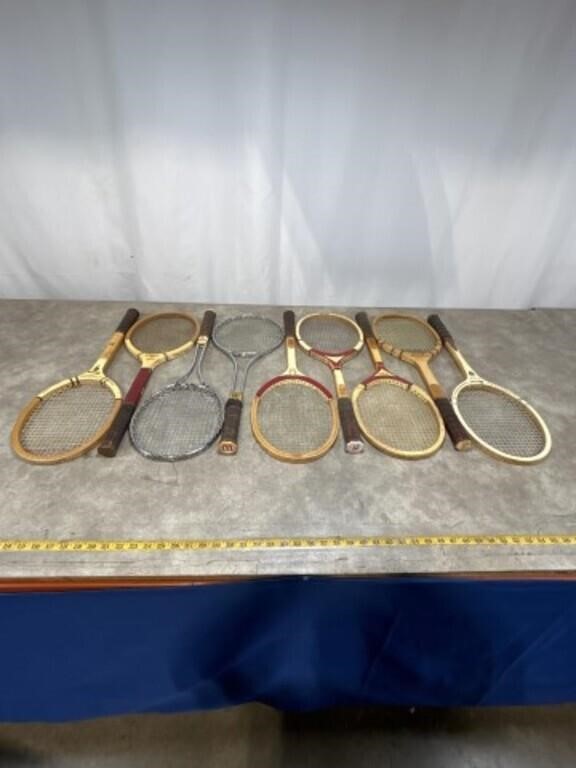 Vintage wood and metal tennis rackets, most are