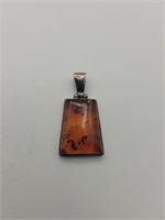 .925 Silver pendant with orange stone