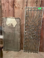 Antique beveled glass window panel. Basement