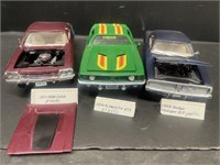 Trio plastic models. Includes a 1971 Hemi