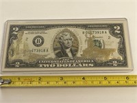 Two dollar US navy gold hologram bill