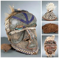 4 African masks / headdresses, 20th century.