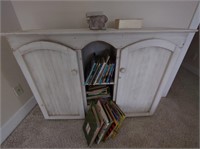 Wooden hutch and children's books