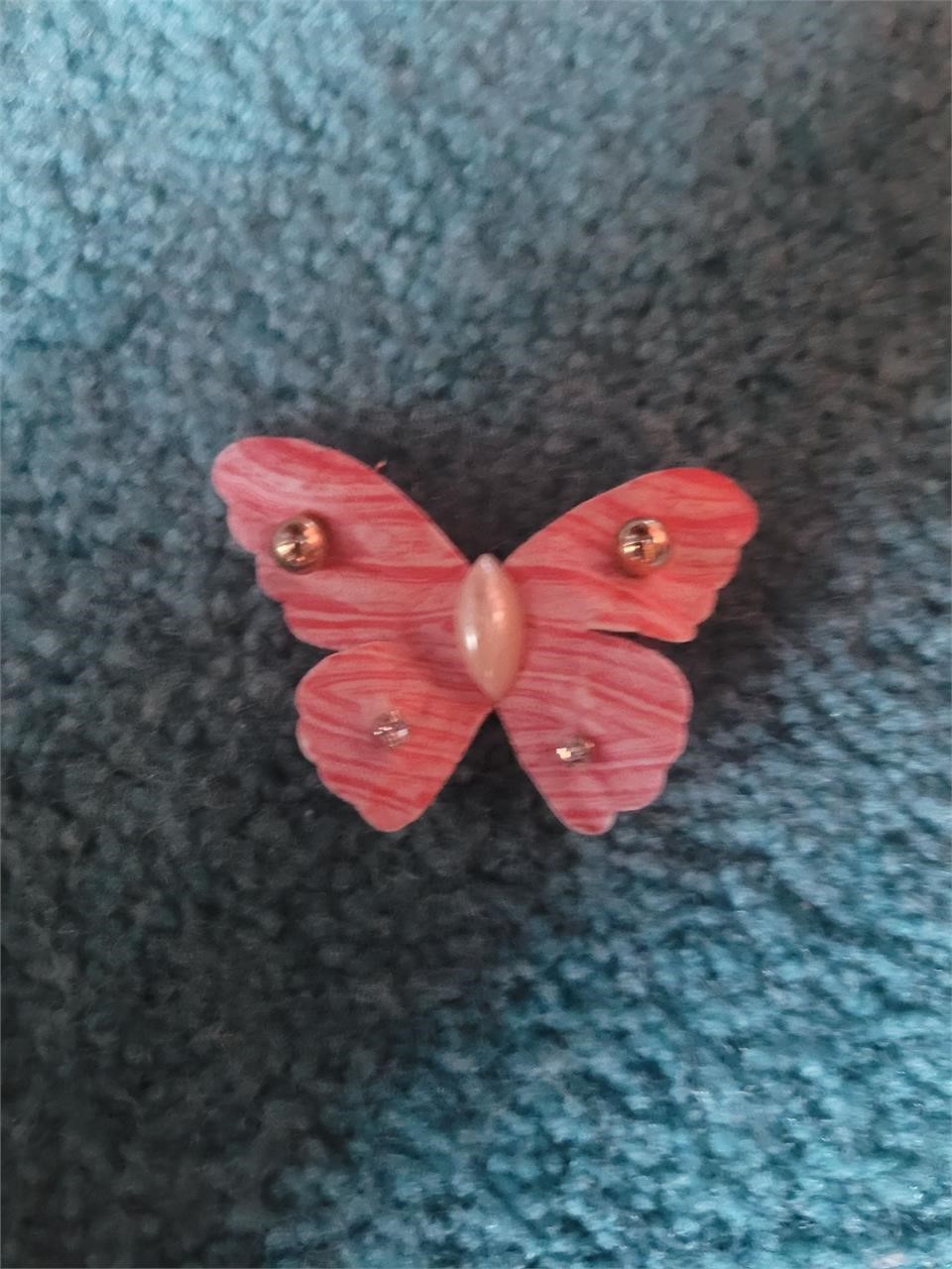 2 sets earrings on butterfly soap