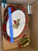 Box of Christmas plates and more. Plaid, Holly,