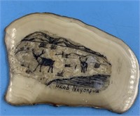 Fossilized ivory scrimshawed platchet by Herb Nayo