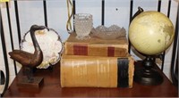 Decor lot; books, globe, carved duck, etc