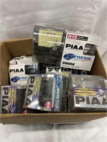 Box lot of headlights for all different cars