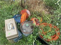 Assorted fuel cans and tackle boxes