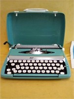 Smith Corona Corsair Deluxe typewriter
Comes