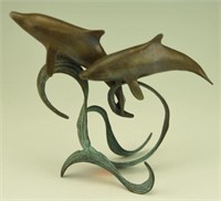 Brass and metal sculpture of dolphins 7”