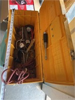 Plastic toolbox with tools and extension cord