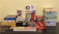 Assortment of Board Games and Jigsaw Puzzles
