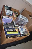 2 Boxes of VHS and DVDs