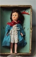 Vintage Doll with case and clothes included
