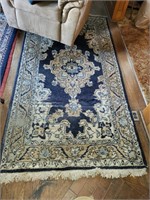 Blue oriental rug 42” x 92”