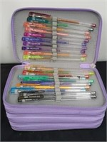 Nice container of colored gel pens
