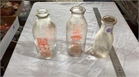 Vintage glass milk jugs