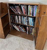 91 - DVD STORAGE CABINET W/ CONTENTS