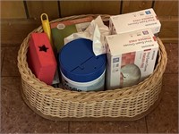 Basket with disposable gloves, wipes and more