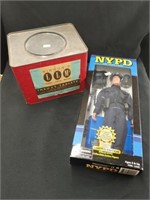 Advertising Tin Gibson LLM's & NYPD Police Figure