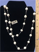30" strand of fresh water pearls with silver alloy