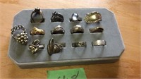 Assorted rings and possibly Tiger eye men’s ring