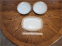 Two Large Bowls And Serving Platter.  
Platter