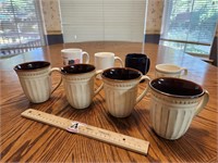 4 Elite Coffee Cups And 4 Assorted Mugs.  
Lot