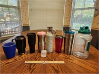 8 Cups, 6 Are To Go Cups With Lids and Reusable