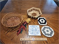 Two Baskets, Wax Chili Peppers, And Three Trivets