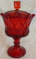 Red glass footed candy dish with a lid