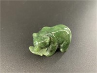 Alaskan Kobuk jade carved large bear who has caugh