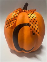 Orange, pumpkin with the letter c