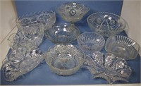 Ten various pressed glass fruit bowls.