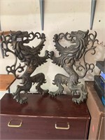 2- cast iron fighting lions decor