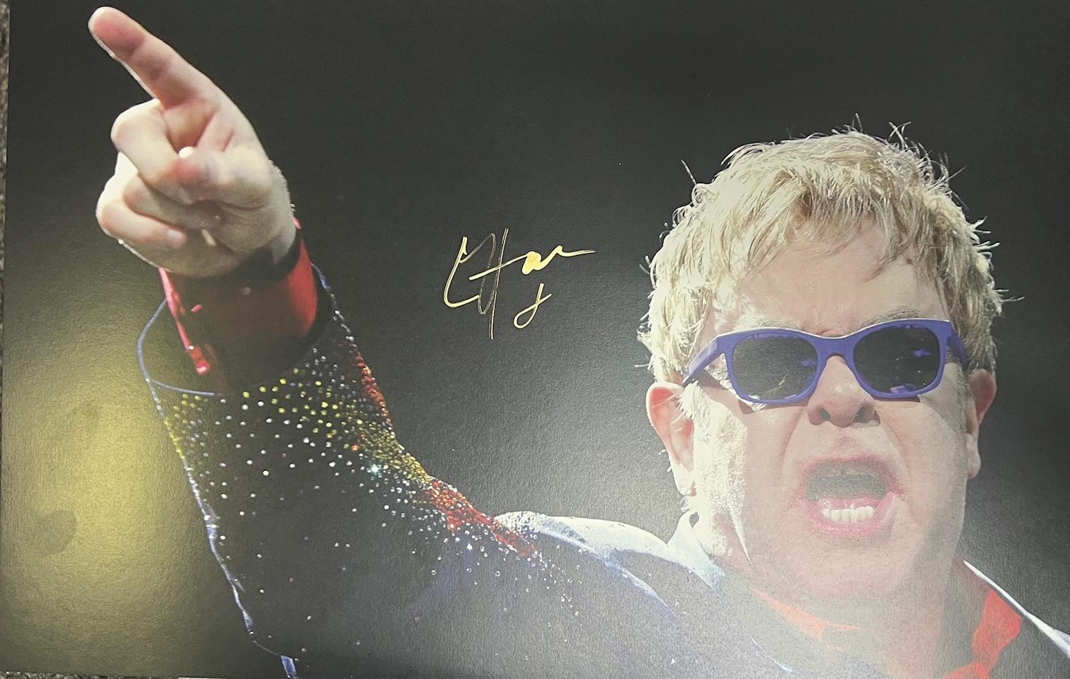 Elton John Signed 11x17 with COA