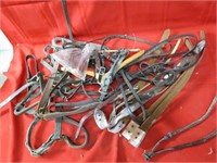 Assorted leather horse tack lot.
