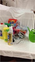 Group of household cleaners with plastic wrap wax