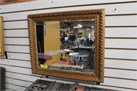 Gold Tone Framed Beveled Mirror.  25" x 21"