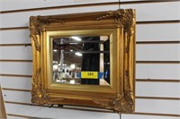 Gold Toned Ornate Framed Beveled Mirror. 17" x 15"