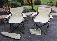 Two Versalite folding lawn chairs with cup holders