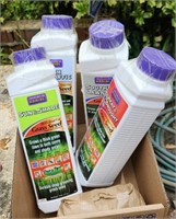 4 bottles Bonide grass seed plus mystery seed