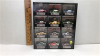 12PC NASCAR RACING CHAMPIONS CARS IN DISPLAY