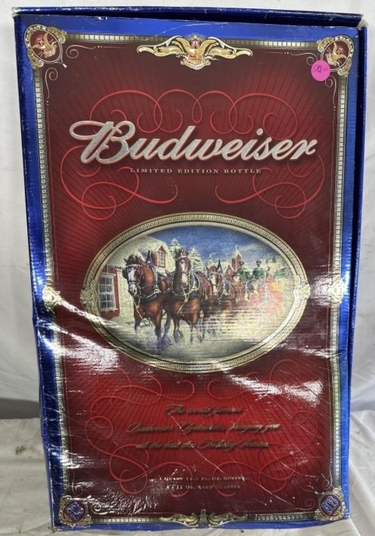 Budweiser holiday empty bottle and four glasses
