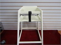 White restaurant style high chair.