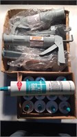 12 ea. caulk guns and dowsil adhesive/sealant