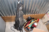 baseball bag, bat and helmet, and water bottles