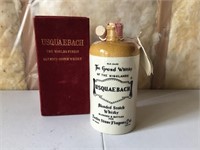 Sealed Usquiabrach Liquor Bottle