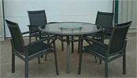 Patio table with lazy Susan and 4 chairs